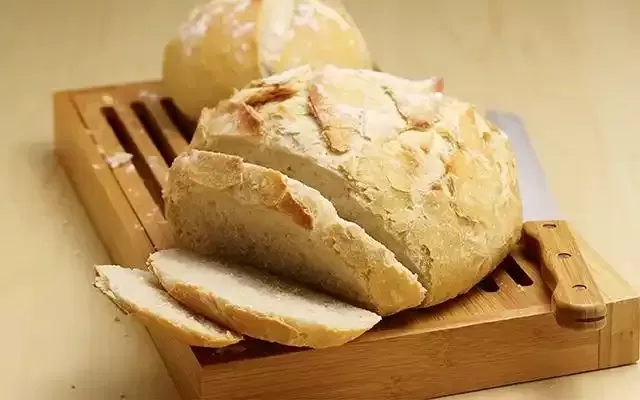 Sourdough Starters: Flour Shapes Microbial Evolution